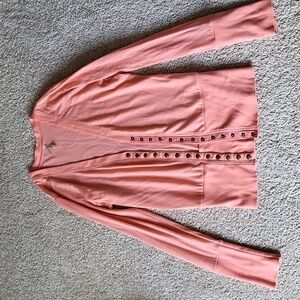 Peach snap sweater